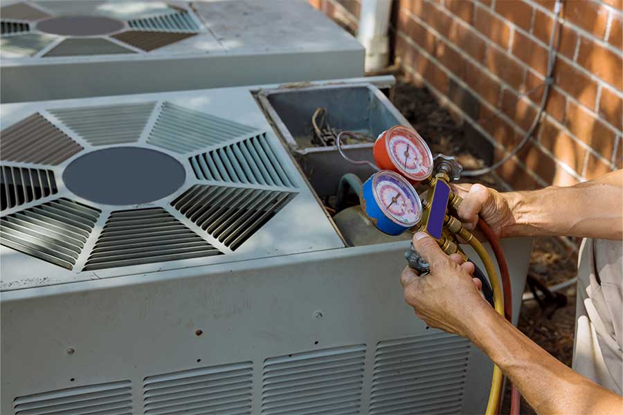 HVAC gauges in use for refrigerant leak repair in Phoenix, AZ